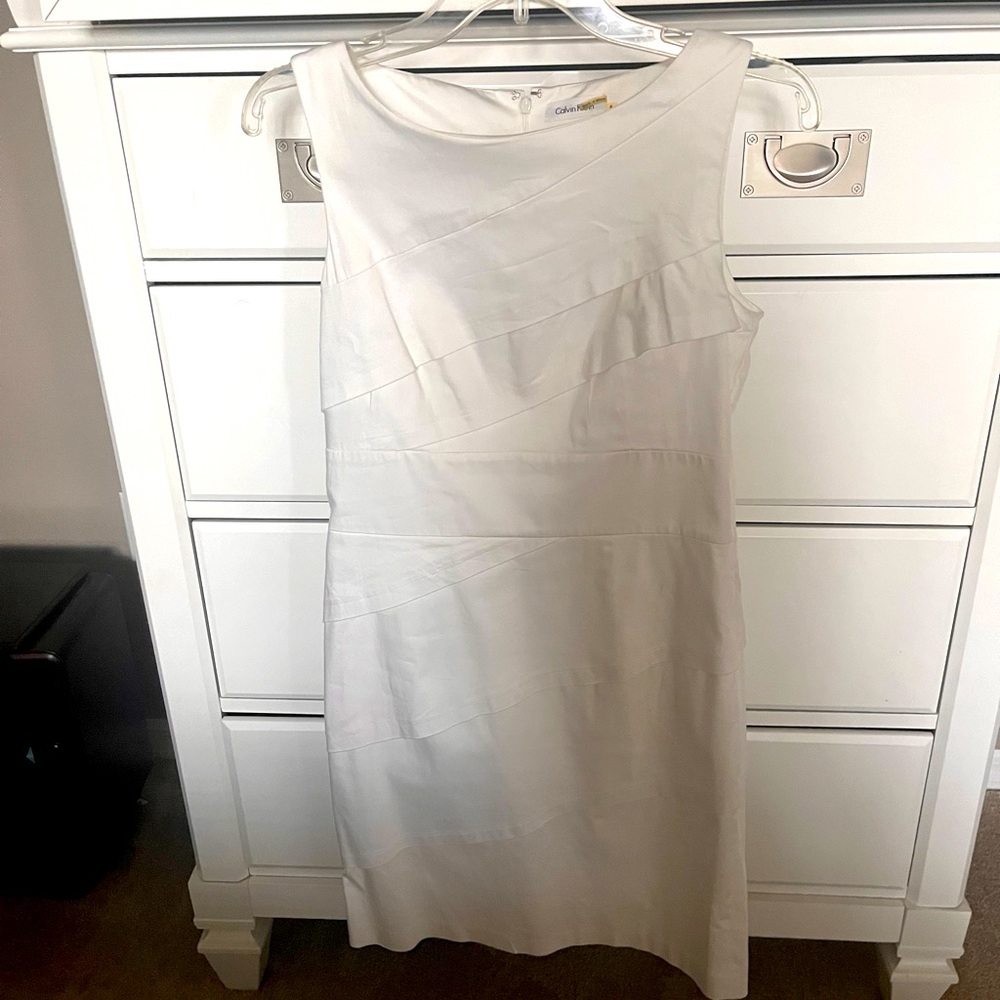 Calvin Klein sleeveless dress-layers in front zip up back .97%cotton 3% spandex